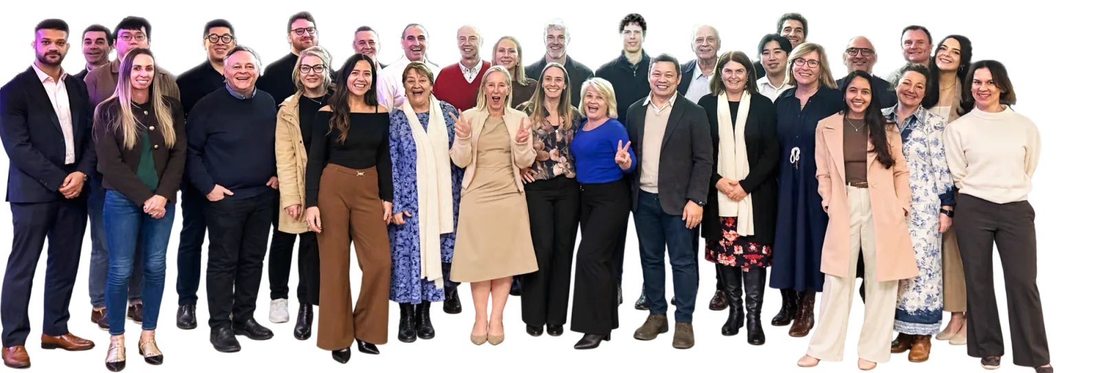 The Customer Science team standing together and smiling.