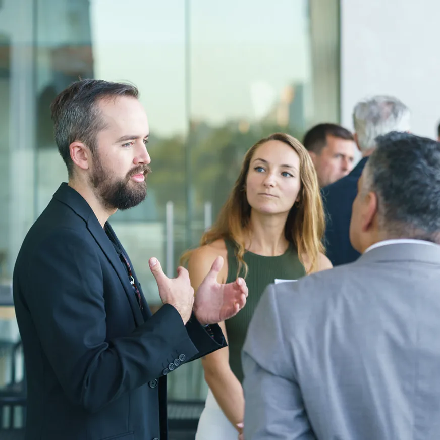 Event attendees discussing ideas together.
